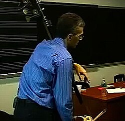 Manhattan School of Music professor Timothy Cobb teaching a bass lesson in the late 2000s. His bass has a low C extension with a metal "machine" with buttons for playing the pitches on the extension.