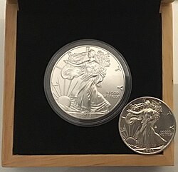 An American Silver Eagle minted in 2019 (left), an example of a Bullion coin. Its obverse design is based on the older, formerly circulating silver Walking Liberty half dollar (right).