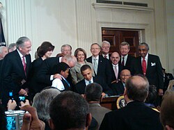 President Obama signing the Affordable Care Act into law in 2010.
