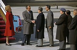 President Nixon shakes hands with Chinese premier Zhou Enlai upon arriving in Beijing for his historic visit to mainland China in February 1972