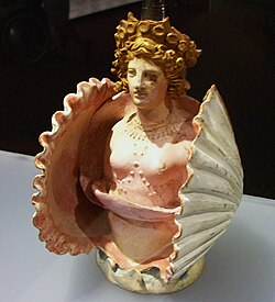 Early fourth-century BC Attic pottery vessel in the shape of Aphrodite inside a shell from the Phanagoria cemetery in the Taman Peninsula
