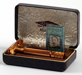 A 1930s Gillette One-Piece Tech razor and a pack of Blue Blades