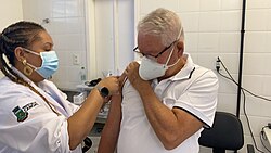 An elderly man receiving a second dose of the CoronaVac vaccine in Brazil in April 2021