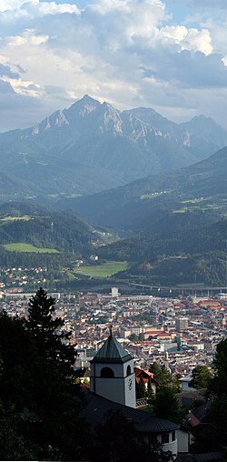 Panoramic view looking down with Serles in the background