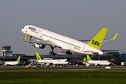 An airBaltic Boeing 757−200WL takes off at Riga International Airport (RIX).