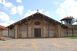 A church and bell-tower in frontal view (2009)