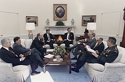 Bush meets with Robert Gates, General Colin Powell, Secretary Dick Cheney and others about the situation in the Persian Gulf, 1991