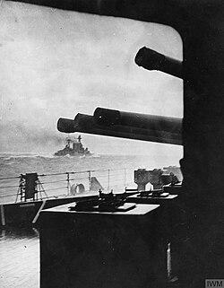 The battlecruiser HMS Hood (in the distance) steaming into battle minutes before being sunk by the German battleship Bismarck on 24 May 1941