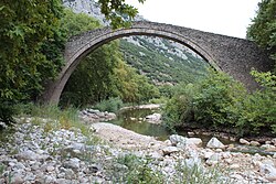 The stone arch Portaikos bridge, built in 1514.