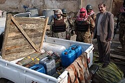 Car bomb in Iraq, made up of a number of artillery shells concealed in the back of a pickup truck