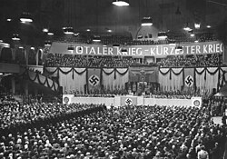 Sportpalast speech, 18 February 1943. The banner says "TOTALER KRIEG – KÜRZESTER KRIEG" ("Total War – Shortest War").