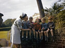 A nurse with child evacuees from Plymouth in the garden of Weizmann's home at Tapley Park in the English village of Instow, north Devon, 1942