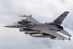 F-16C of the South Carolina Air National Guard in-flight over North Carolina equipped with air-to-air missiles, bomb rack, targeting pods, and electronic countermeasures pods