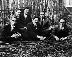 Ehrenfest's students, Leiden 1924. Left to right: Gerhard Heinrich Dieke, Samuel Abraham Goudsmit, Jan Tinbergen, Paul Ehrenfest, Ralph Kronig, and Enrico Fermi