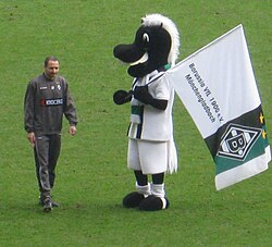 Oliver Neuville and mascot Jünter
