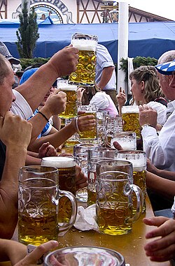 One-litre beer mugs (German: Maßkrüge) at the Oktoberfest in Germany