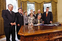 Congressman Manzullo attends a bill signing in the Oval Office