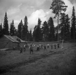 Finnish children playing volleyball in a rural area (1950s)