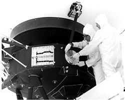 The golden record is attached to the spacecraft.