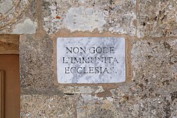 Plaque at St. Mary Magdalene Chapel, Dingli, Malta, indicating that the chapel did not enjoy ecclesiastical immunity