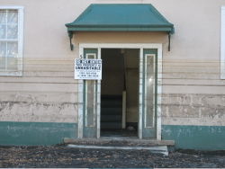 After the flooding: Building displays lines from various levels of long standing floodwaters and has been deemed "unhabitable".