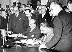 Nasser signing unity pact with Syrian president Shukri al-Quwatli, forming the United Arab Republic, 1 February 1958