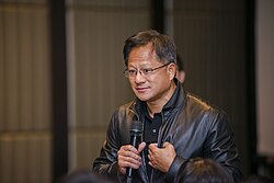 Jensen Huang, billionaire, founder and CEO of Nvidia, the largest AI conglomerate and the largest company in the world as of November 2024