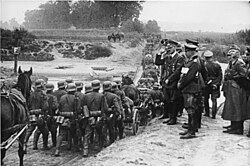 Hitler reviews troops on the march during the Invasion of Poland, September 1939