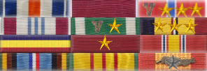 Commander Richard Marcinko's ribbon rack worn in the standard U.S. Navy style, rows of three with no spacing or staggering.
