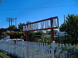 A sign showing the old name of the neighborhood.