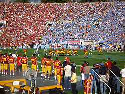 UCLA–USC rivalry; both are located in LA and members of the Pac-12 Conference, and moved together to the Big Ten Conference in 2024. The rivalry is unusual in the National Collegiate Athletic Association (NCAA) Division I sports, because the campuses are only 12 miles (19 km) apart, and located within the same city.