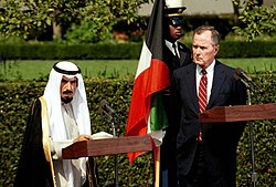 President Bush with Jaber Al-Ahmad Al-Sabah on the South Lawn of the White House, 1990.