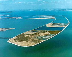 The Pointe Mouillee State Game Area, one of the 221 state game and wildlife areas in Michigan. It encompasses 7,483 acres of hunting, recreational, and protected wildlife and wetland areas at the mouth of the Huron River at Lake Erie, as well as smaller outlying areas within the Detroit River.