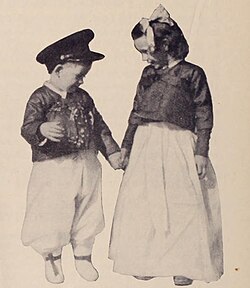 George M. McCune dressed in Korean clothing alongside his sister Anna, 1915