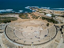 Caesarea Maritima, also known as Caesarea Palestinae, built under Herod the Great at the site of a former Phoenician naval station, became the capital city of Roman Judea, Roman Syria Palaestina and Byzantine Palaestina Prima provinces.[66]