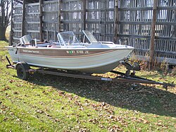 Lowe Boats Sea Nymph recreational fishing boat on a boat trailer