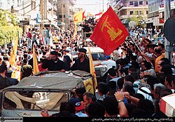 Hezbollah members and supporters parade following the end of the Israeli occupation of Southern Lebanon, May 2000