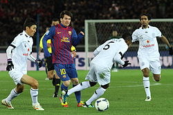Messi's dribbling abilities allow him to weave past several defenders and orchestrate attacking plays.