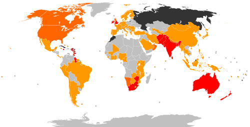 ICC member nations. The (highest level) Test playing nations are shown in red; the associate member nations are shown in orange, with those with ODI status in a darker shade; suspended or former members are shown in dark grey.