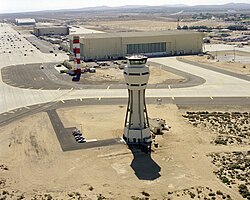 Aerial view of the new control tower with the old tower in the background