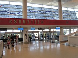 The shuttle stop at Terminal F, pictured in August 2022