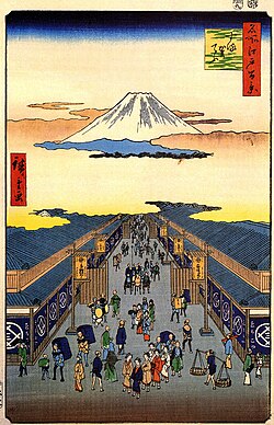 Utagawa Hiroshige designed an ukiyo-e print with Mount Fuji and Echigoya as landmarks. Echigoya is the former name of Mitsukoshi named after the former province of Echigo. The Mitsukoshi headquarters are located on the left side of the street.