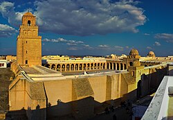 The Great Mosque of Kairouan in Tunisia, also called the Mosque of Uqba, is one of the most significant and best preserved artistic and architectural examples of early great mosques. Dated in its present state from the 9th century, it is the ancestor and model of all the mosques in the western Islamic lands.[42]