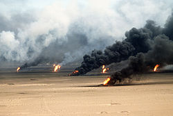 Oil well fires rage outside Kuwait City in 1991.