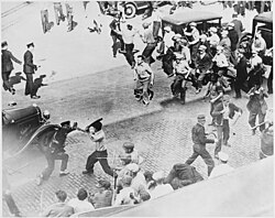 Teamsters wielding pipes, clash with armed police in the streets of Minneapolis during a 1934 strike