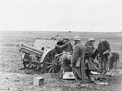 Italian troops manning a 10 cm howitzer at Guadalajara, 1937