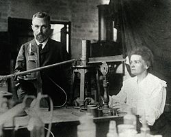 Pierre and Marie Curie in the laboratory, c. 1904