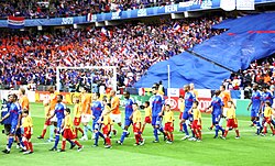 Henry (in blue, fourth from right) enters the field with France in their Euro 2008 game against the Netherlands.