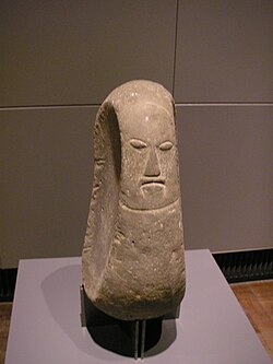 A stone carving of a Hawaiian deity, housed at a German museum