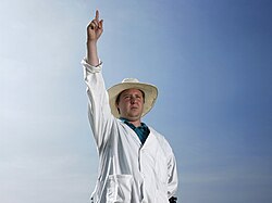 The umpire signaling a dismissal